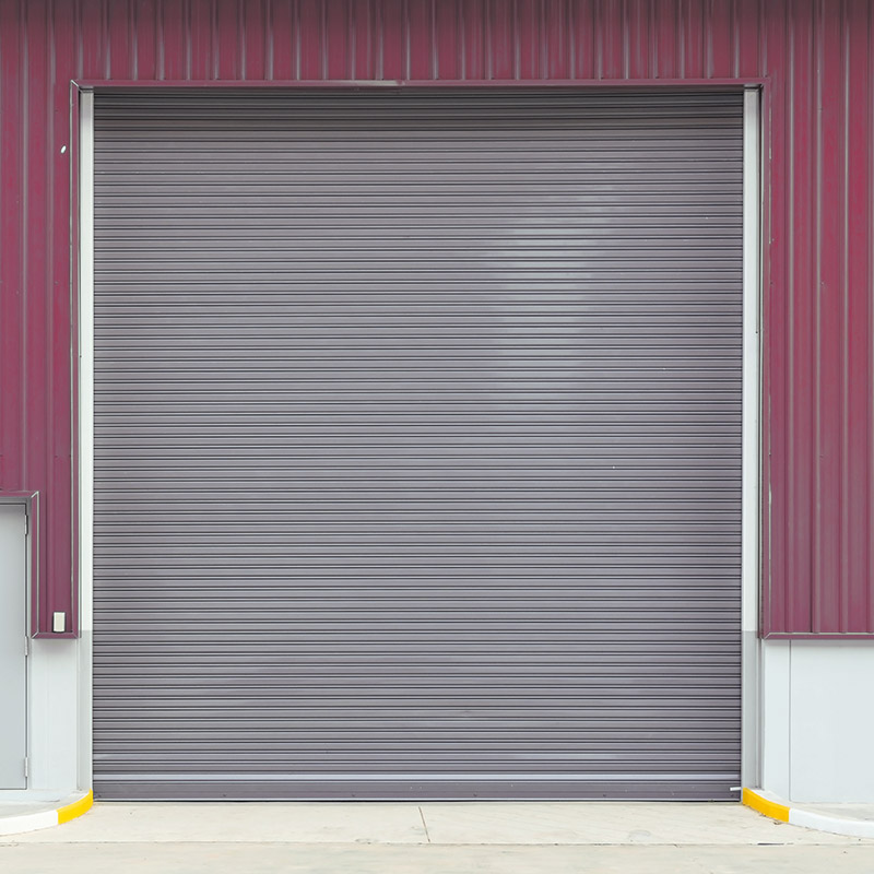 Shutter door or roller door and concrete floor outside factory b Shutter door or roller door and concrete floor outside factory building use for industrial background.